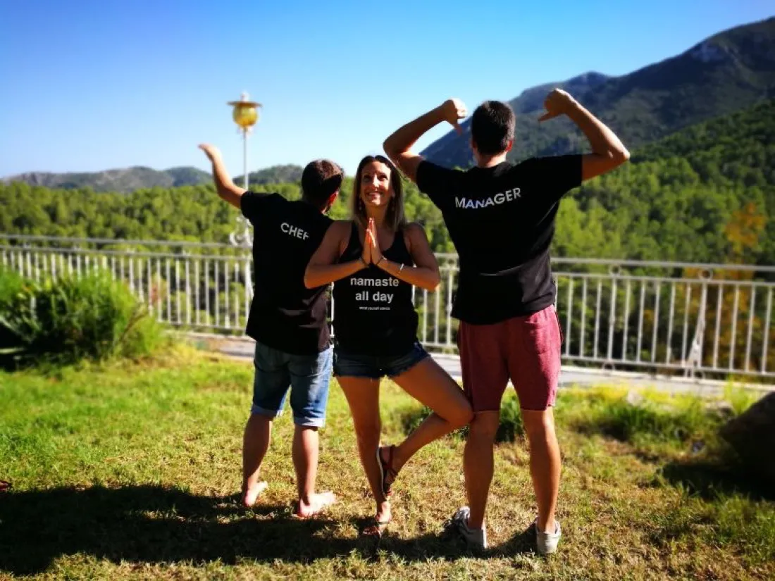 Posing with friends at a mountain retreat
